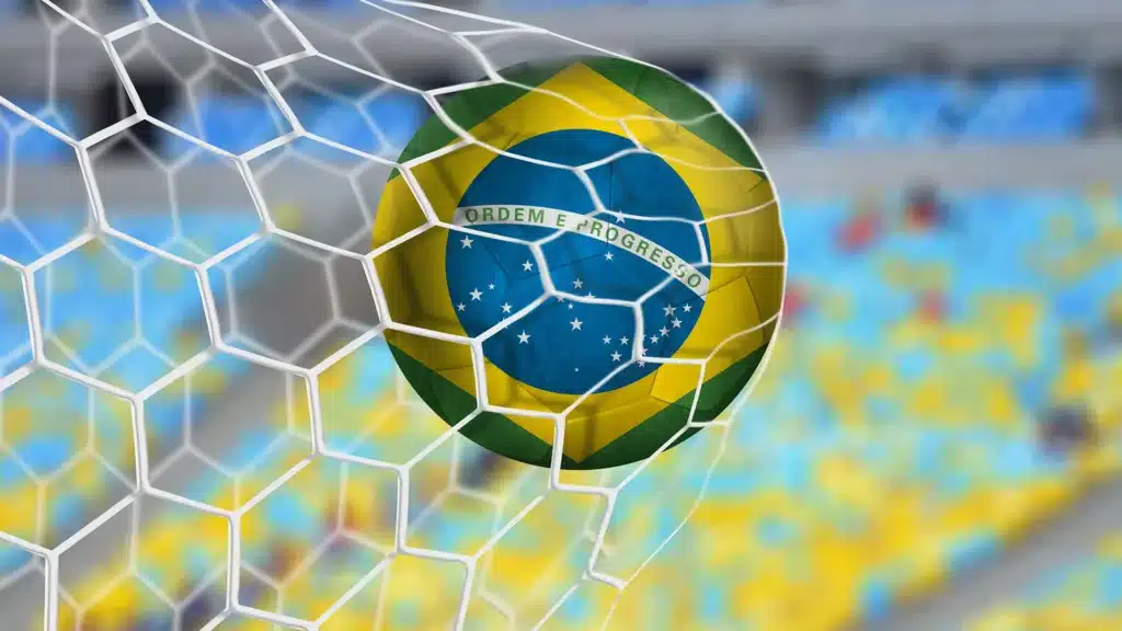 Soccer ball with the Brazilian flag design in the back of the net, representing the Women's World Cup 2027 soccer tour to Brazil