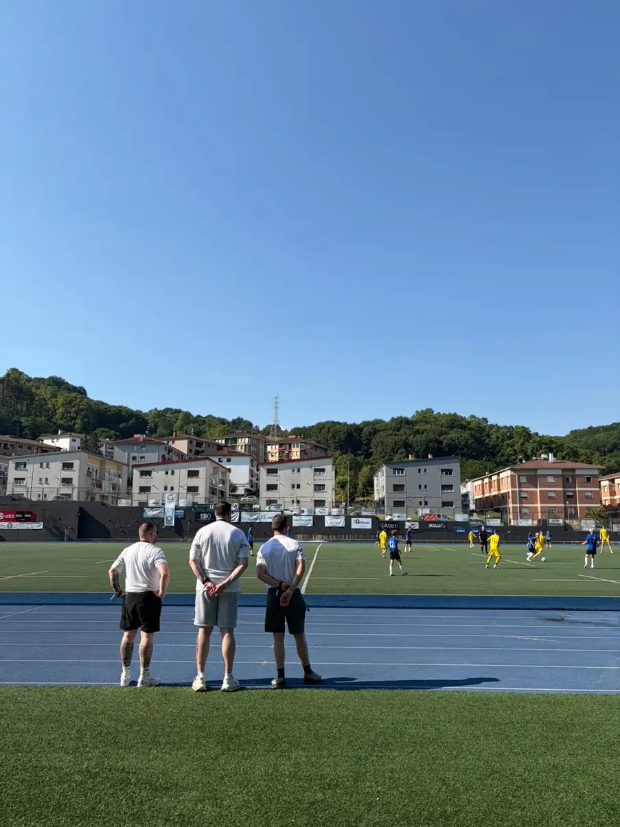 Coaches watching Donosti Cup 2026 match from the sideline